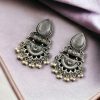 Elegant brass stud earrings with beautiful stone detailing, perfect for women.