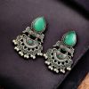 Elegant brass stud earrings with beautiful stone detailing, perfect for women.