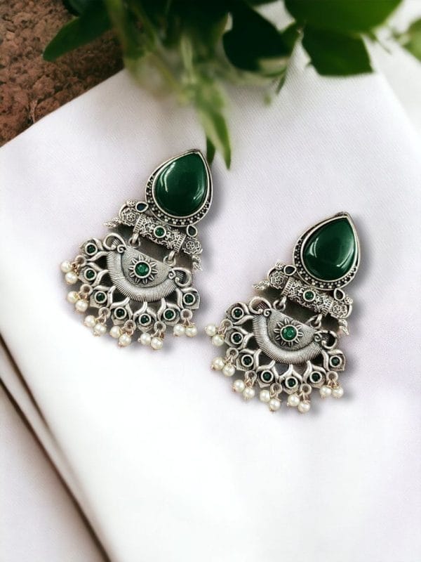 Elegant brass stud earrings with beautiful stone detailing, perfect for women.
