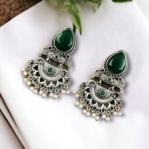 Elegant brass studs earrings with beautiful stone detailing, perfect for women.