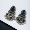 Elegant brass stud earrings with beautiful stone detailing, perfect for women.