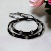 Elegant daily wear anklets with intricate thread work and flower charms in German silver, designed for a graceful and comfortable fit.