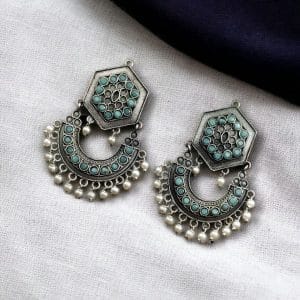 Brass stone stud earrings with intricate design, perfect for ethnic occasions, offering a blend of elegance and tradition.