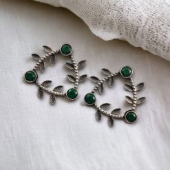 Leaf-inspired brass earrings with stone stud earrings accents, perfect for enhancing any occasion with elegant design