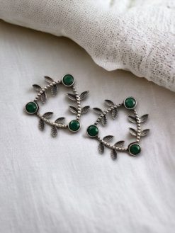 Leaf-inspired brass earrings with stone stud earrings accents, perfect for enhancing any occasion with elegant design