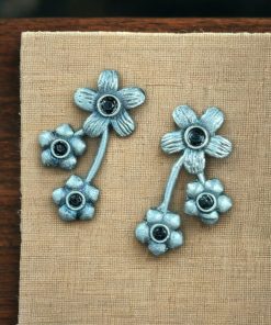 Elegant flower stone stud brass earrings with a delicate floral design and shimmering stones, perfect for adding sophistication to any outfit.