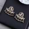 Perfect Ethnic Brass Stone Stud Earrings featuring an intricate peacock design, adorned with sparkling stones and delicate ghungroo charms, ideal for traditional wear