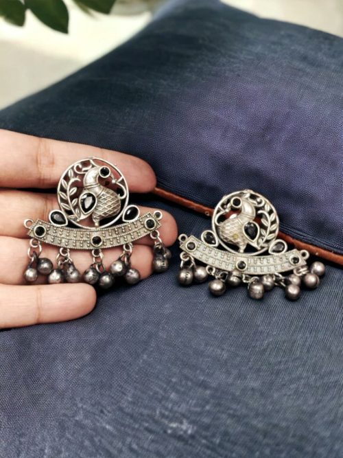 Perfect Ethnic Brass Stone Stud Earrings featuring an intricate peacock design, adorned with sparkling stones and delicate ghungroo charms, ideal for traditional wear