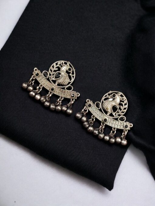 Perfect Ethnic Brass Stone Stud Earrings featuring an intricate peacock design, adorned with sparkling stones and delicate ghungroo charms, ideal for traditional wear