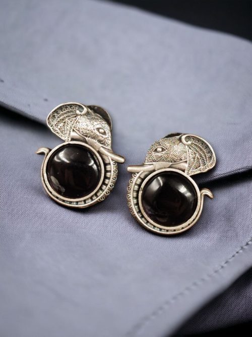 Adorable silver replica elephant design earrings with Monalisa stone studs, perfect for casual wear