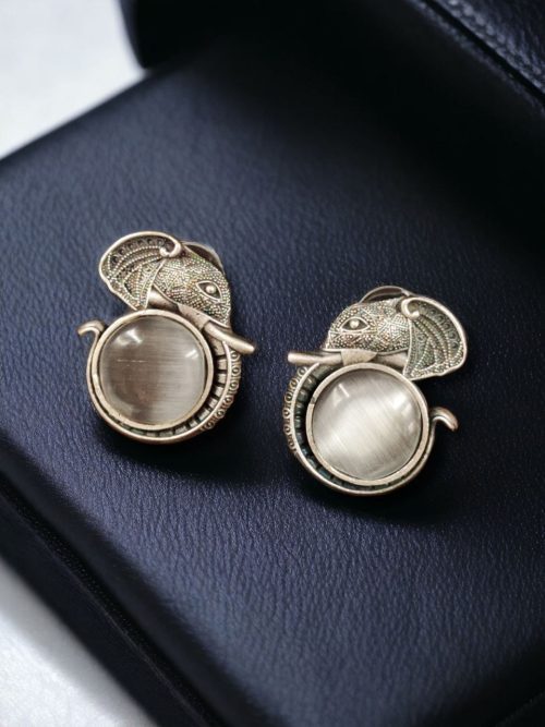 Adorable silver replica elephant design earrings with Monalisa stone studs, perfect for casual wear