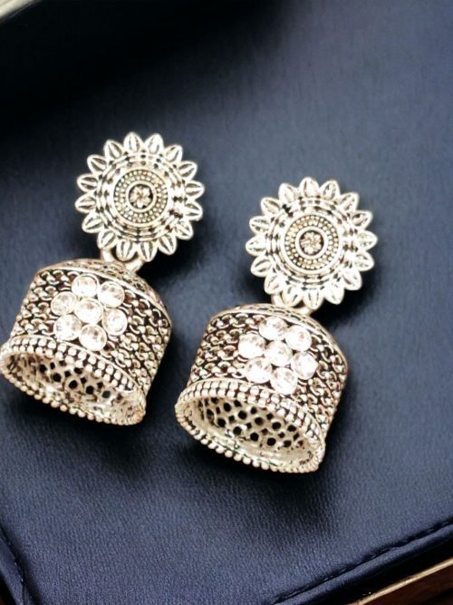 Elegant German Silver Stud Jhumka Earrings with intricate oxidized detailing, perfect for adding grace to any traditional or casual outfit.
