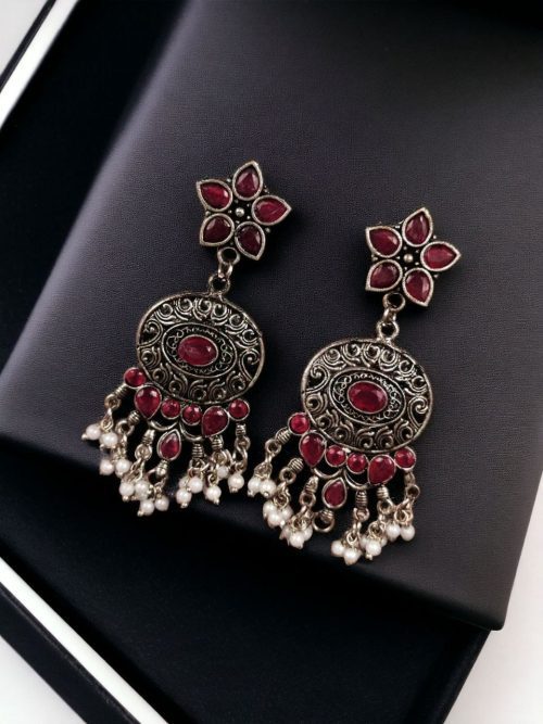 Elegant ethnic hanging stone stud earrings crafted from brass, perfect for any occasion.