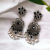 Elegant ethnic hanging stone stud earrings crafted from brass, perfect for any occasion.
