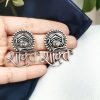 Brass Shakti Stud Earrings with intricate detailing, perfect for ethnic wear.
