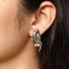 Elegant parrot design brass earrings featuring intricate craftsmanship, lightweight structure, and a timeless charm, perfect for festive and casual occasions.