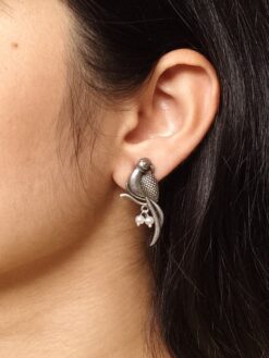 Elegant parrot design brass earrings featuring intricate craftsmanship, lightweight structure, and a timeless charm, perfect for festive and casual occasions.