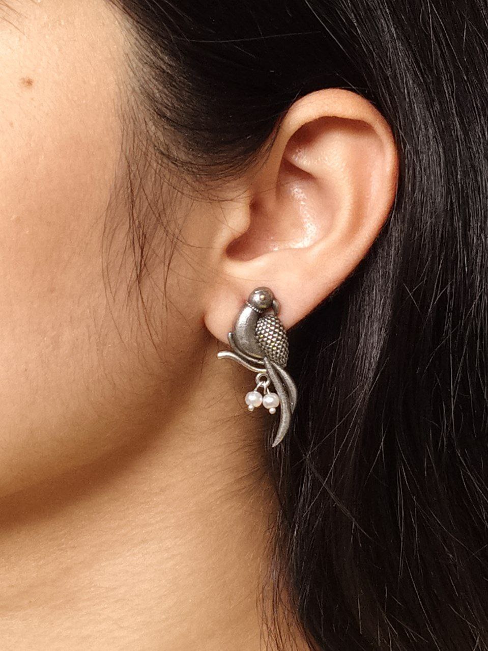 Elegant Parrot Design Brass Earrings: The Perfect Statement Jewelry 1 Elegant parrot design brass earrings featuring intricate craftsmanship, lightweight structure, and a timeless charm, perfect for festive and casual occasions.