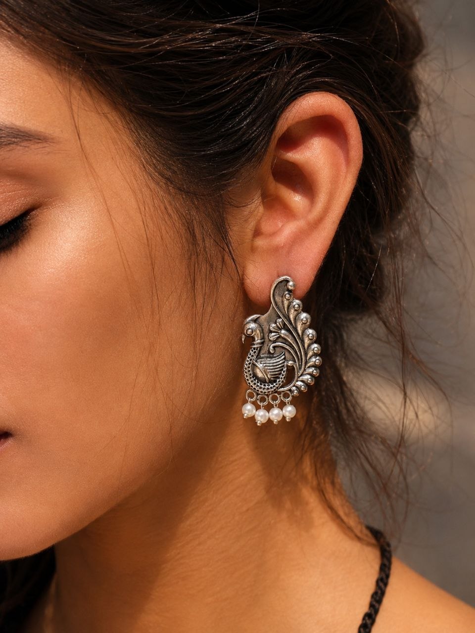 Admire Your Style with Perfect Brass Peacock Stud Earrings 1 Perfect Brass Peacock Stud Earrings with intricate design, ideal for enhancing traditional and modern outfits
