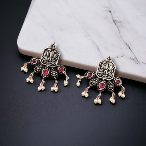 Unique German Silver Lotus Stud Earrings with a stunning oxidized finish and intricate stone detailing, perfect for a stylish and elegant look.