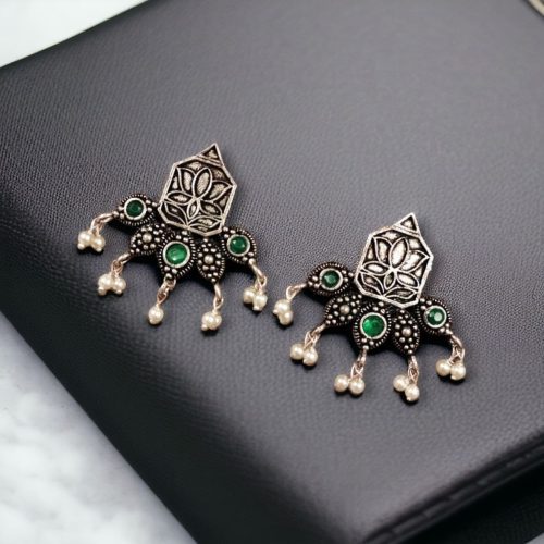 Unique German Silver Lotus Stud Earrings with a stunning oxidized finish and intricate stone detailing, perfect for a stylish and elegant look.