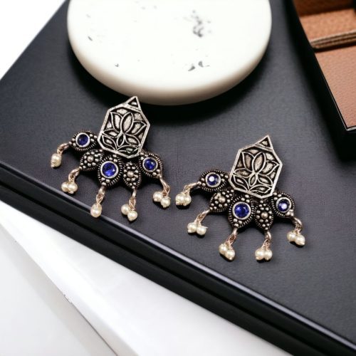 Unique German Silver Lotus Stud Earrings with a stunning oxidized finish and intricate stone detailing, perfect for a stylish and elegant look.