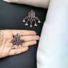 Unique German Silver Lotus Stud Earrings with a stunning oxidized finish and intricate stone detailing, perfect for a stylish and elegant look.