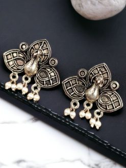 Beautiful German silver peacock stud earrings with intricate detailing and stone embellishments, perfect for adding an ethnic touch to any outfit.