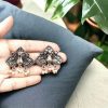 Beautiful German silver peacock stud earrings with intricate detailing and stone embellishments, perfect for adding an ethnic touch to any outfit.