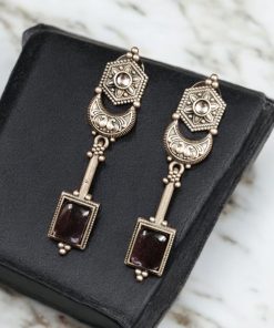 Traditional silver replica earrings with oxidized dangler design and stone embellishments, perfect for adding a touch of vintage elegance to any outfit.