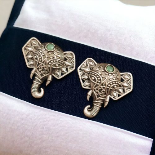 Unique brass elephant stud earrings featuring intricate detailing and embedded stones, perfect for an elegant and cultural look.