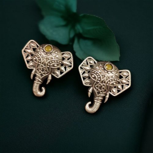 Unique brass elephant stud earrings featuring intricate detailing and embedded stones, perfect for an elegant and cultural look.