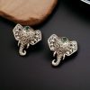 Unique brass elephant stud earrings featuring intricate detailing and embedded stones, perfect for an elegant and cultural look.