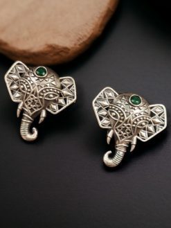 Unique brass elephant stud earrings featuring intricate detailing and embedded stones, perfect for an elegant and cultural look.