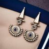Elegant hanging stone stud earrings featuring a sophisticated design, perfect for every occasion and versatile for any outfit.