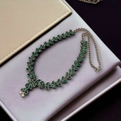 Premium brass stone necklace featuring intricate craftsmanship and stunning stone embellishments, perfect for a statement look
