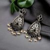 Elegant brass stone hanging stud earrings with intricate detailing, perfect for ethnic wear and festive occasions.