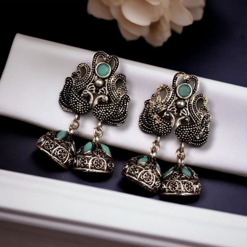 Beautiful German Silver Peacock Stud Earrings with intricate stone detailing and a traditional oxidized finish