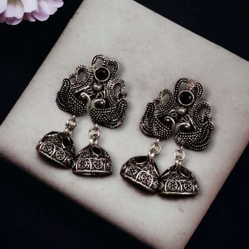 Beautiful German Silver Peacock Stud Earrings with intricate stone detailing and a traditional oxidized finish