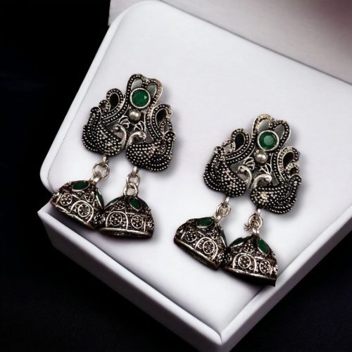Beautiful German Silver Peacock Stud Earrings with intricate stone detailing and a traditional oxidized finish