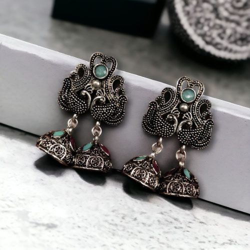 Beautiful German Silver Peacock Stud Earrings with intricate stone detailing and a traditional oxidized finish