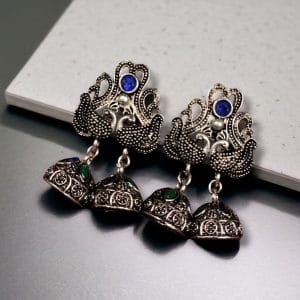 Beautiful German Silver Peacock Stud Earrings With Perfect Stone Detailing - color: "Blue-Green"