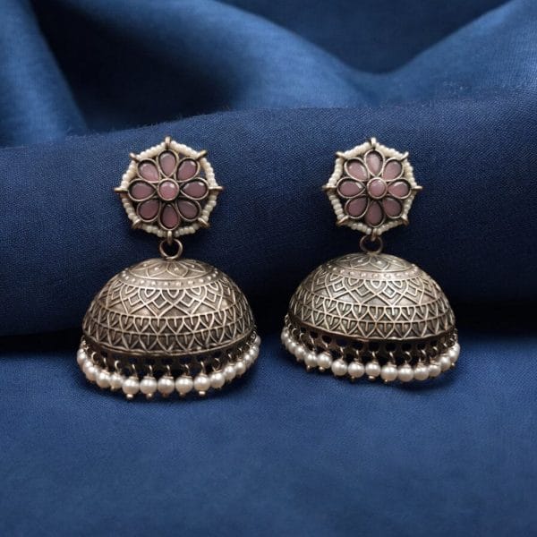 Handmade jhumka earrings with pearl and stone work, perfect for ethnic wear.