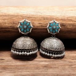 Handmade jhumka earrings with pearl and stone work, perfect for ethnic wear.
