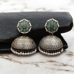 Handmade jhumka earrings with pearl and stone work, perfect for ethnic wear.