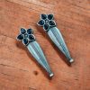 Oxidized Silver Stud Earrings with Floral Design and Delicate Stone Work.