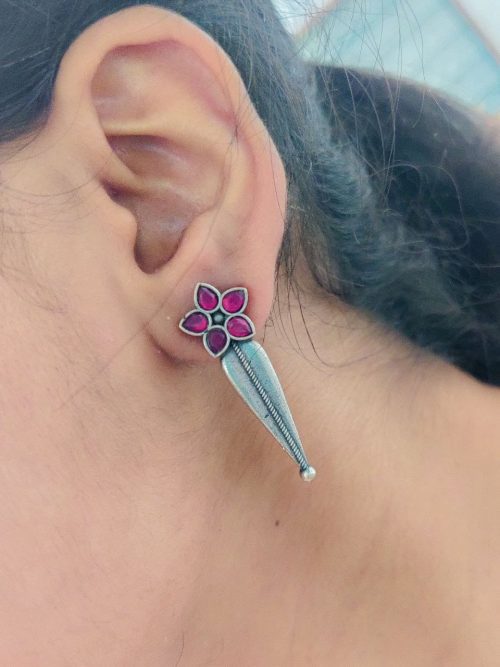 Oxidized Silver Stud Earrings with Floral Design and Delicate Stone Work.