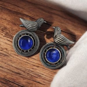 Silver Look alike Oxidized Bird Stud Earrings with Stunning Monalisa Stone - color: "Blue"