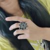 Oxidised handpainted flower finger ring with intricate meenakari work and adjustable design, perfect for traditional and ethnic wear.