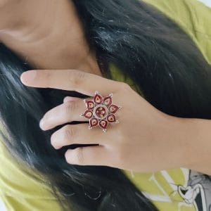 Oxidised handpainted flower finger ring with intricate meenakari work and adjustable design, perfect for traditional and ethnic wear.